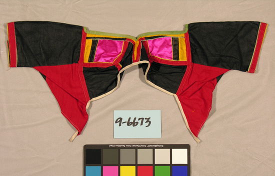 Hearst Museum object titled Blouse, accession number 9-6673, described as Baiga woman’s short cotton pierced blouse; black, red, fuchsia, green, and yellow, width 28 inches.