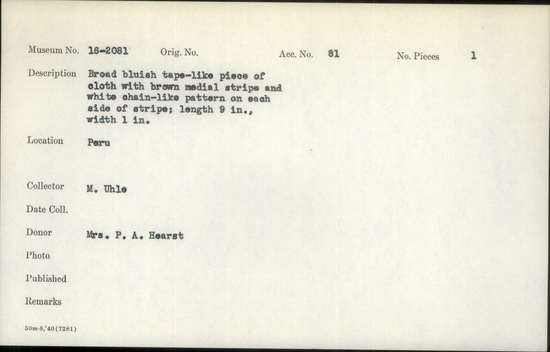 Documentation associated with Hearst Museum object titled Cloth, accession number 16-2081, described as Broad bluish tape-like piece of cloth with brown medial stripe and white chain-like pattern on each side of stripe; length 9 inches; width 1 inch.