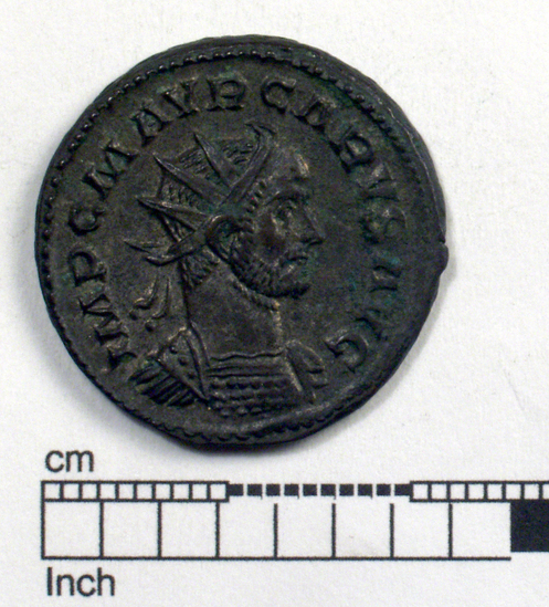 Hearst Museum object 1 of 10 titled Coin: billon antoninianus, accession number 8-4388, described as Coin; Billon; Antoninianus; Roman. 4.76 grams, 23 mm. Carus, 282-285 AD. Lyon, France. Obverse: IMP C M AVR CARVS AVG, bust r. radiate, cuirassed. Reverse: VICTORIA AVGG, Victory l. on globe between two captives; to l., A.