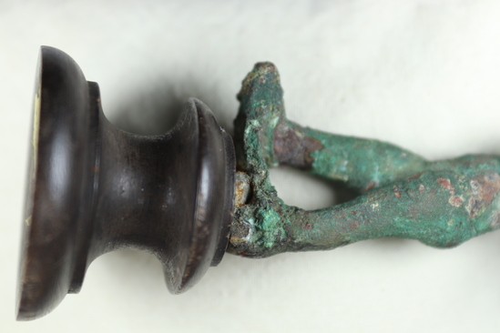 Hearst Museum object 16 of 19 titled Statue fragment, accession number 8-3472, described as Cast bronze fragment of male forehead preserving locks of hair