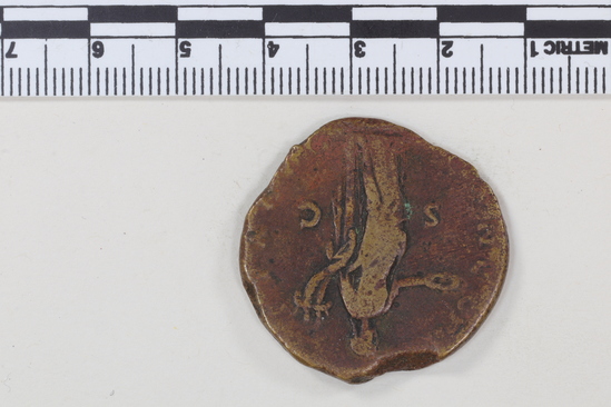 Hearst Museum object 8 of 9 titled Coin: æ sestertius, accession number 8-6478, described as Coin: Sestertius; Æ; Faustina (Faustina I, wife of Antoninus Pius) Ru. Concordia C.154, Varient. - 13.2 gm. Broken flan.