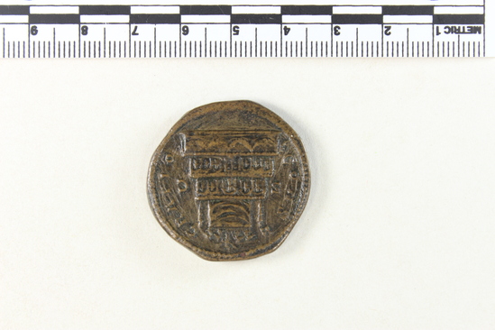 Hearst Museum object 4 of 8 titled Coin: æ sestertius, accession number 8-4879, described as Coin; AE; Sestertius; Roman. 32 mm. Commodus, 180 AD. Rome, Italy. Obverse: DIVVS M ANTONINVS PIVS, bust of Divus Marcus r.. Reverse: CON SE CRATIO, funeral pyre with Marcus Aurelius in quadriga on top; in field, S C.