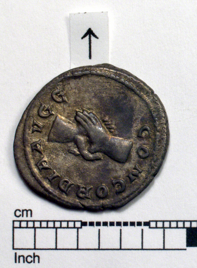 Hearst Museum object 3 of 6 titled Coins: ar denarius and quinarius, accession number 8-4363, described as Coin; AR; Denarius; Roman. 4.83 grams, 24 mm. Balbinus, AD 238, Rome, Italy. Obverse: IMP CAES D CAEL BALBINVS AVG, bust r. radiate. Reverse: CONCORDIA AVGG, clasped hands.