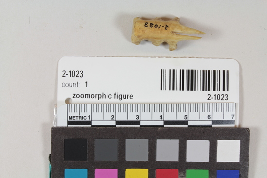 Hearst Museum object titled Zoomorphic figure, accession number 2-1023, described as 6-legged animal with 2 prongs at face end; bone.