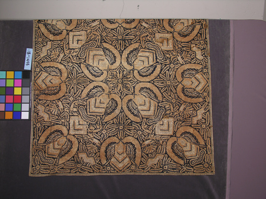 Hearst Museum object titled Headcloth, accession number 18-1495, described as Headcloth; cotton batik with very abstracted bird design and multiple geometric and curvilinear designs; very poor condition (stained and torn); indigo and beige. 108.4 x 108 cm.