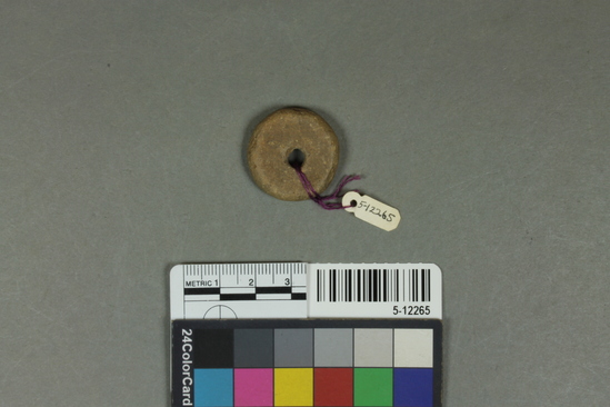 Hearst Museum object titled Bead, accession number 5-12265, described as Clay bead