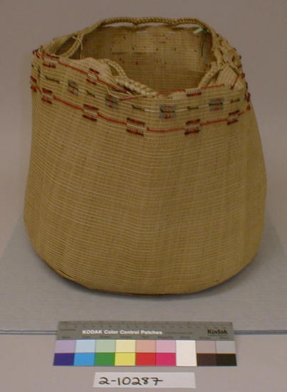 Hearst Museum object titled Basket, accession number 2-10287, described as Upper edge braided for drawstring; grass stems; decorated with worsted of various colors.