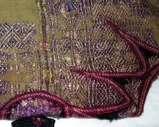 Hearst Museum object 4 of 4 titled Huipil, accession number 3-29639, described as Huipil: Backstrap-loomed, plain weave. Two-faced supp. weft brocading. Three pieces joined back, front, and sides by randa. End selvedges loom-finished. Head hole cut out and hemmed with hand-stitching; decorated with neckpiece.