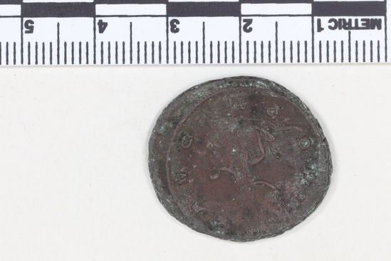 Hearst Museum object 3 of 8 titled Coin: billon antoninianus, accession number 8-4067, described as Coin; Billon; Antoninianus; Roman. 4.30 grams, 26 mm. Aurelian, 270-275 AD. Rome, Italy. Obverse: IMP C AVRELIANVS, Bust r. radiate. Reverse: ORIENS AVG, Sol l., between two captives, in exergue P M