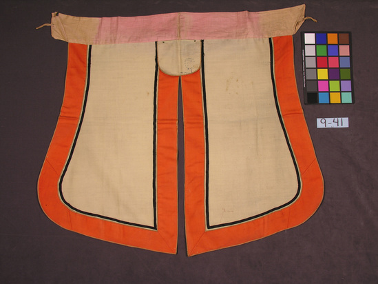 Hearst Museum object titled Trousers, accession number 9-41, described as Open-legged trousers; white and orange