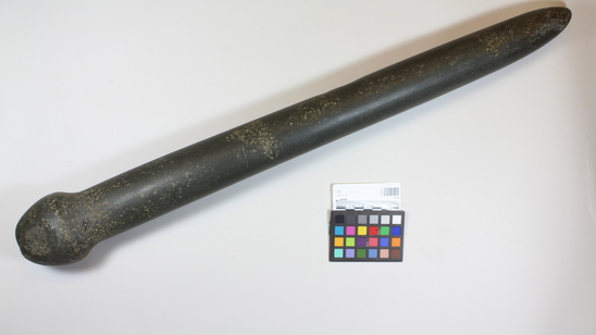 Hearst Museum object titled Pestle, accession number 1-19, described as Stone; black; bulbous distal end; pointed proximal end.