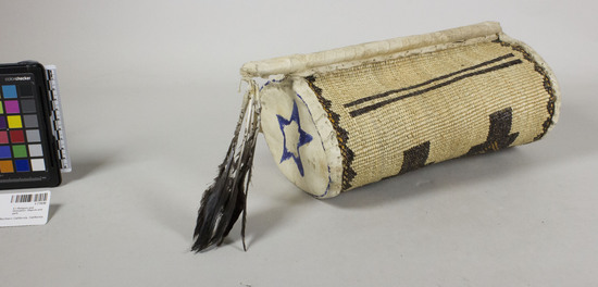 Hearst Museum object titled Basket, accession number 1-71030, described as Basket used in dance. Twined, with feathers attached.