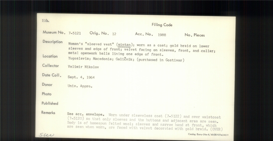 Documentation associated with Hearst Museum object titled Vest, accession number 7-5121, described as Woman's sleeved vest (mintan); worn as a coat; gold braid on lower sleeves and edge of front; velvet facing on sleeves, front, and collar; metal openwork balls lining one edge of front. Worn under sleeveless coat 7-5122 and and over waistcoat 7-5120  so that only sleeves and the buttons and adjacent areas are seen. Body is of homespun felted wool; sleeves and narrow band at front, which are seen when worn, are faced with velvet decorated with gold braid. 7-5120-22 always worn as a single unit. Worn everyday but especially on Sunday and for festivals, and especially by younger women. Made by Terzija, professional tailors who make folk costumes. Worn by women at time of collection, 1964. 7-5119-5128 comprise a complete costume.