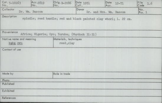 Documentation associated with Hearst Museum object titled Spindle, accession number 5-10163, described as spindle;  reed handle;  red and black painted clay whorl;  L. 22 cm.