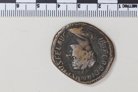 Hearst Museum object 6 of 8 titled Coin: æ sestertius, accession number 8-5921, described as Coin: Sestertius; Æ; Gordianus.Pius - 17.17 grams. Rome, 240-244 AD. Obverse: IMP GORDIANVS PIVS FEL AVG - bust facing right, laureate, draped, cuirassed. Reverse: FELICI T TEMPOR, SC - Felicitas standing holding long caduceus and cornucopiae.