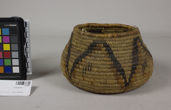 Hearst Museum object 2 of 2 titled Basket, accession number 1-11007, described as Globular. Red and black zigzag design.