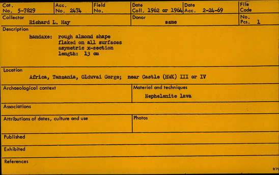 Documentation associated with Hearst Museum object titled Handaxe, accession number 5-7829, described as Handaxe:  rough almond shape; flaked on all surfaces; asymmetric x-section; length 13 cm.