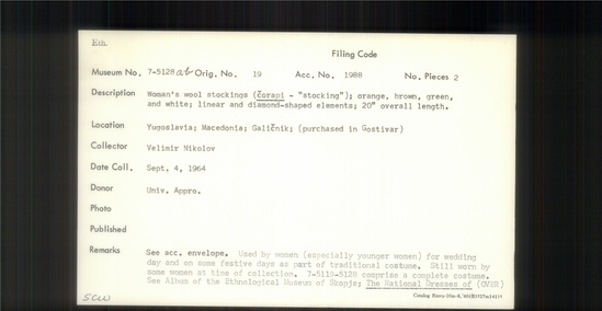 Documentation associated with Hearst Museum object titled Stocking, accession number 7-5128a,b, described as Woman's woll stockings (corapi - "stocking"); orange, brown, green, and white; linear and diamond-shpaed elements; 20"overall length.  Used by women (especially younger women) for wedding day and on some festive days as part of traditional costume. Still worn at time of collection, 1964. 7-5119-5128 comprise a complete costume.