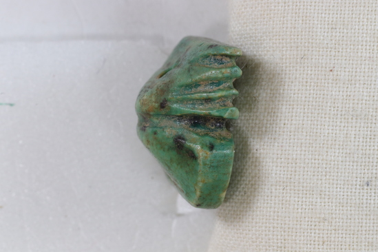 Hearst Museum object 4 of 9 titled Amulet seal, accession number 6-22123, described as Pyramidal amulet-seal; 16x17 mm, of greenish faience