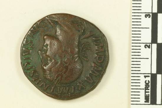 Hearst Museum object 2 of 2 titled Coin: æ sestertius, accession number 8-9456, described as Æ sestertius. Maximinus Thrax. Obverse: Head. Reverse: Victoria Augusti