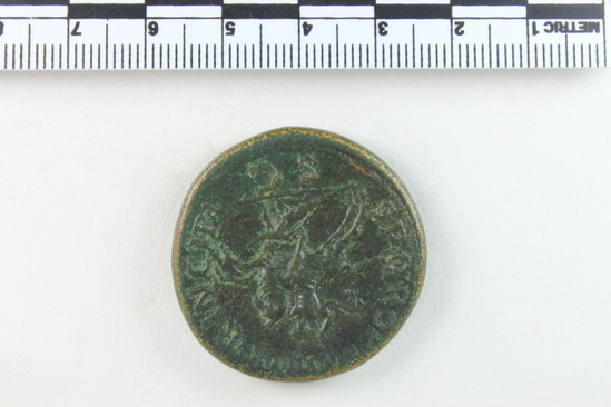 Hearst Museum object 4 of 12 titled Coin: æ sestertius, accession number 8-5518, described as Coin; AE; Sestertius; Roman. 26.65 grams, 33 mm. Trajan, 103-111 AD. Obverse: IMP CAES NERVAE TRAIANO AVG GER DAC PM TRP COS V(?) PP(?), head of Trajan r. laureate. Reverse: S.P.Q.R. OPTIMO PRINCIPI, Trajan mounted r. cuirassed and cloaked, lance aimed at barbarian r.; in exergue, S C