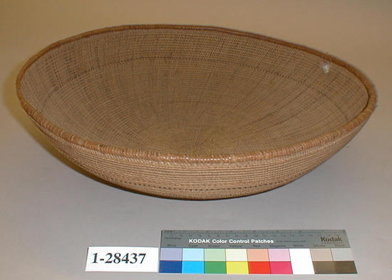 Hearst Museum object 1 of 2 titled Basket, accession number 1-28437, described as Openwork twined basket.  Shallow.  One brown band.