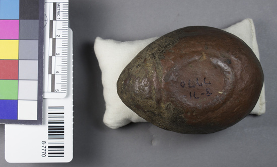 Hearst Museum object titled Oil lamp, accession number 8-7770, described as Lamp; pottery; brown burnished top blackened; single spout and lug-depressed discus w/ tongue design