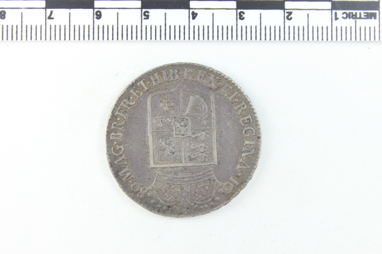 Hearst Museum object 3 of 4 titled Coin, accession number 7-2782, described as Silver; Obverse: GVLIEL. MUS. ET. MARIA. DEI. GRATIA' Reverse: MAG. BR. FR. ET. HIB. REX. ET. REGINA 1689; 14.77 grams.