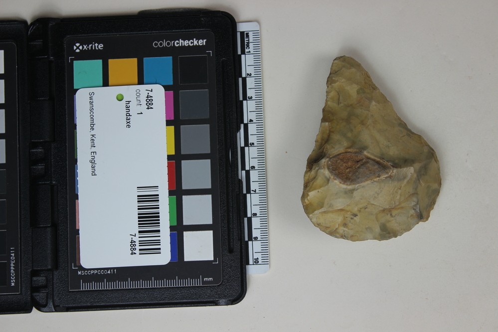 Hearst Museum object titled Handaxe, accession number 7-4884, described as Acheulian Handaxe; light brown flint