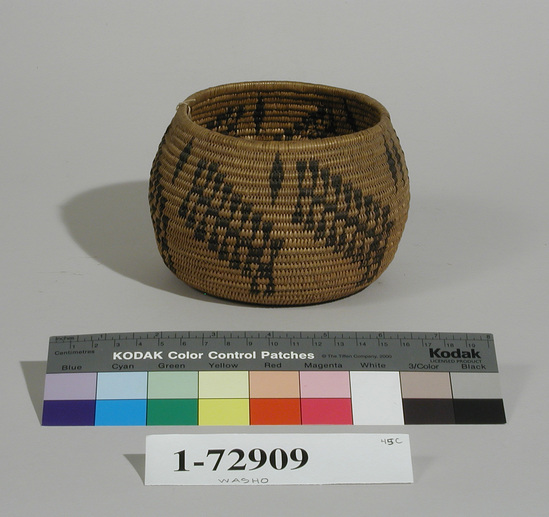 Hearst Museum object titled Basket, accession number 1-72909, described as Coiled; incurved.  Black design.