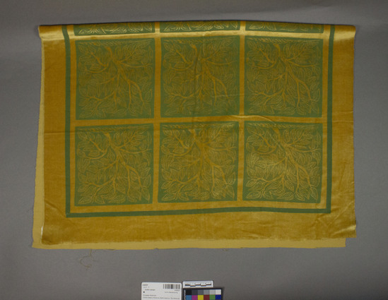 Hearst Museum object titled Textile sample, accession number 2-62537, described as Strip; silk or rayon, paint, cut pile, block printed, yellow ground, green designs, tree motives