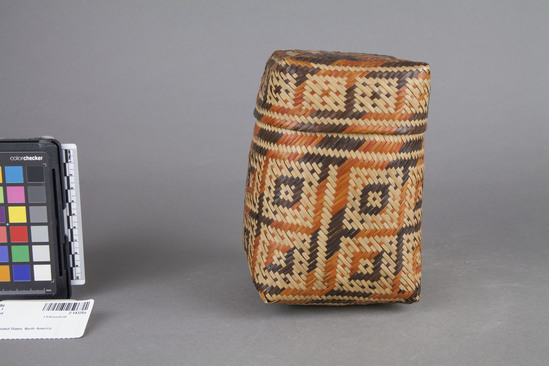 Hearst Museum object titled Basket and lid, accession number 2-14328a,b, described as Rectangular basket, twilled. With cover. Design in black, white, and red.