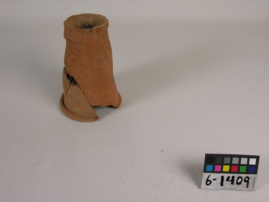 Hearst Museum object titled Pot stand, accession number 6-1409, described as Pottery: red pot rest broken, diameter 12 height 17