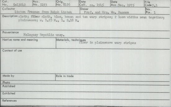 Documentation associated with Hearst Museum object titled Textile, accession number 5-13042, described as Fiber cloth; blue, brown and tan warp stripes. 2 loom widths sewn together; plainweave. W. 1.23 m., L. 2.18 m.
