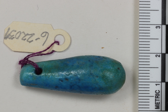 Hearst Museum object 4 of 22 titled Amulets, accession number 6-22037, described as amulets, of blue faience, and one pyramidal seal of steatite