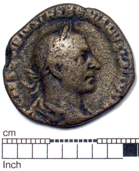 Hearst Museum object titled Coin: æ sestertius, accession number 8-6009, described as Coin: Once sestertius (?); Æ; Trebonianus - 11.66 grams. Obverse: [IMP]CAESVIBIVS TREBONIANVS GALLVS AVG - Bust facing right, draped, laureate. Reverse: IVNONIMAR[TIALI], SC - Juno seated front in round distyle temple: at her side, peacock.