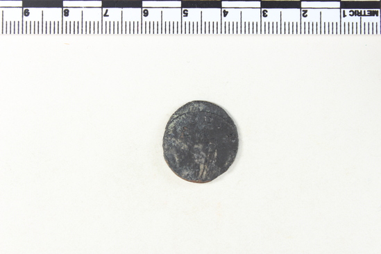 Hearst Museum object 6 of 6 titled Coin: æ antoninianus, accession number 8-6506, described as Coin: Antoninianus; Æ (AR?); Claudius Gothicus Ru. Victory C. - 2.9 gm. Obverse: IMP C CLAVDIVS AVG - Bust facing right, radiate, draped. Reverse: [VI]CT ORIA AVG - Victory standing facing left, holding wreath and palm.