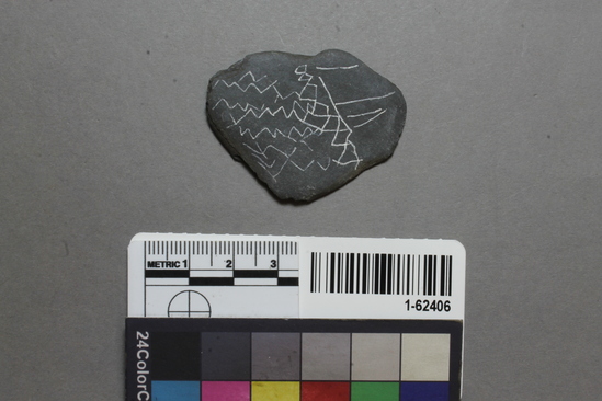 Hearst Museum object titled Pebble, accession number 1-62406, described as small flat shale pebble, with incising on both sides