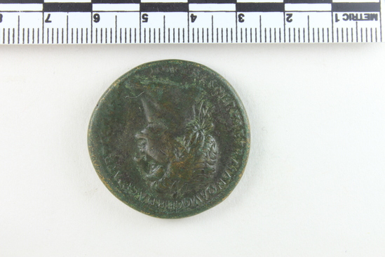 Hearst Museum object 3 of 12 titled Coin: æ sestertius, accession number 8-5518, described as Coin; AE; Sestertius; Roman. 26.65 grams, 33 mm. Trajan, 103-111 AD. Obverse: IMP CAES NERVAE TRAIANO AVG GER DAC PM TRP COS V(?) PP(?), head of Trajan r. laureate. Reverse: S.P.Q.R. OPTIMO PRINCIPI, Trajan mounted r. cuirassed and cloaked, lance aimed at barbarian r.; in exergue, S C