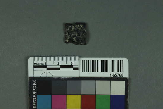 Hearst Museum object titled Projectile point, accession number 1-65768, described as Point fragment, obsidian: type SBa-1