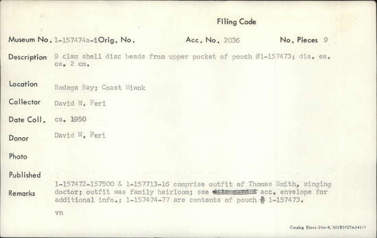 Documentation associated with Hearst Museum object titled Bead, accession number 1-157474a-i, described as Nine clam shell disc beads from the upper pocket of pouch 1-157473.  Diameter of each is ca. 2 cm.