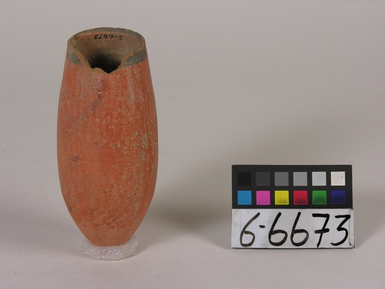 Hearst Museum object titled Beer cup, accession number 6-6673, described as Pottery: deep pointed-bottomed buff cup, red black rim, chipped; least diameter 5 cm, greatest diameter 6 1/2 cm, height 15 cm.