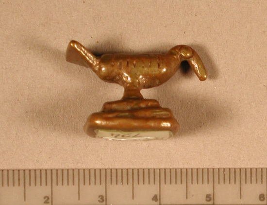 Hearst Museum object titled Gold weight, accession number 5-16646, described as Bird with head down, on pedestal.