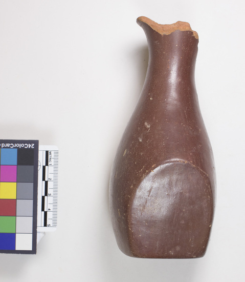 Hearst Museum object 1 of 12 titled Broken bottle, accession number 6-3214, described as Pottery: red bottle flat bottom two flat sides slender neck broken gd 8 cm, height 15 cm