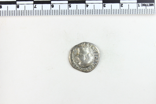 Hearst Museum object 5 of 8 titled Coin: ar denarius, accession number 8-4671, described as Coin; AR; Denarius; Roman. 3.11 grams, 19 mm. Vespasian, 69-70 AD. Rome, Italy. Obverse: IMP CAESAR VESPASIANVS AVG bust r. laureate. Reverse: COSITER TR POT, Pax seated l. holding caduceus and branch.