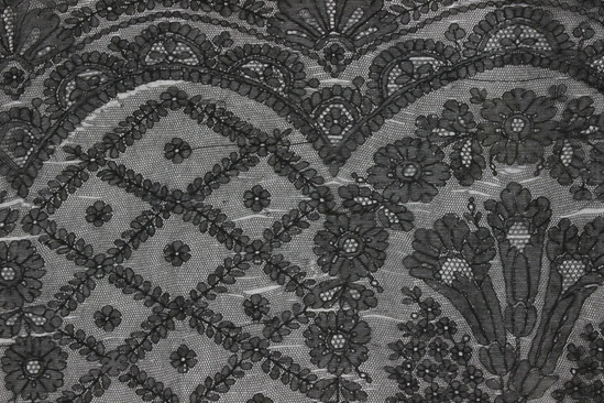 Hearst Museum object 3 of 3 titled Shawl, accession number 3-11063, described as Black lace shawl, floral patterned.