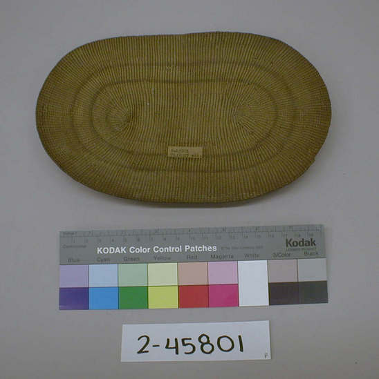 Hearst Museum object titled Place mat, accession number 2-45801, described as Twined basketry; oval placemat. w. 24.5 cm