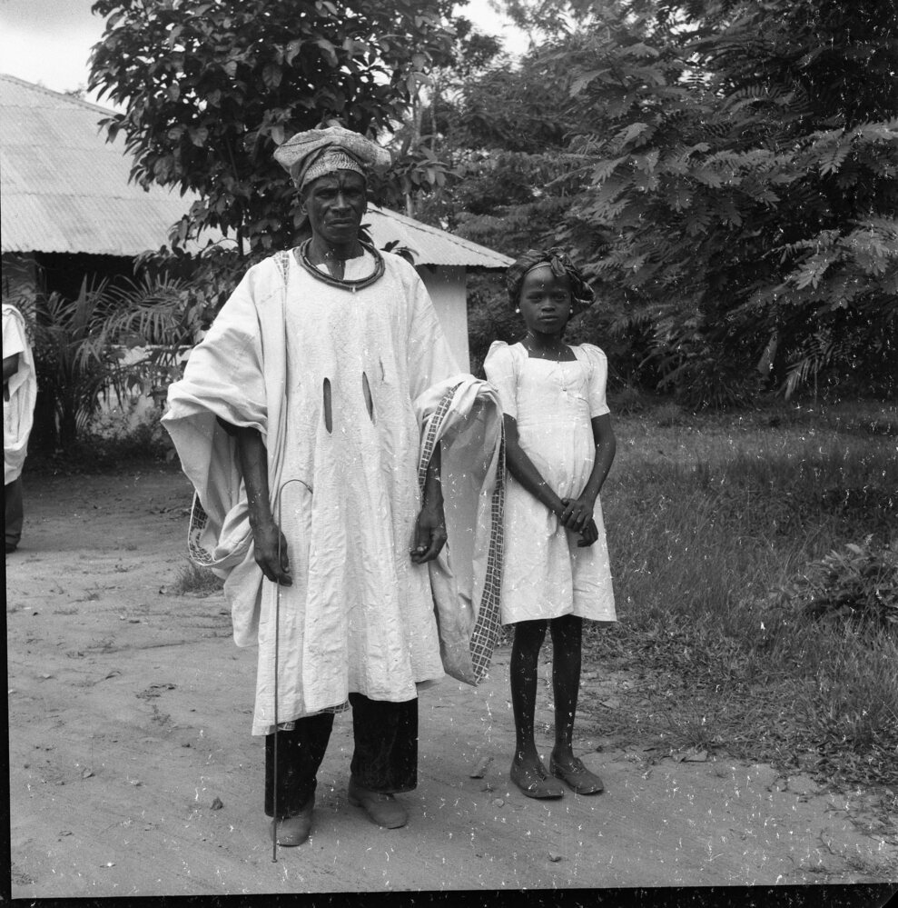 Hearst Museum object titled Black-and-white negative, accession number 15-31677, described as Black-and-white negative, Nigeria, Abeokuta, a man (chief?) and a girl