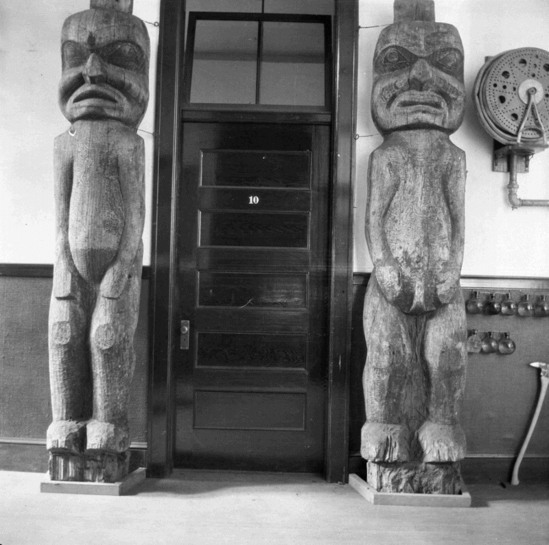 Hearst Museum object titled Post, accession number 2-9222, described as One of pair of house posts from interior of a plank house. Have projection at the top for mortising to roof poles (Charles Brown, 12 June, 1964). Represents an ancestor.