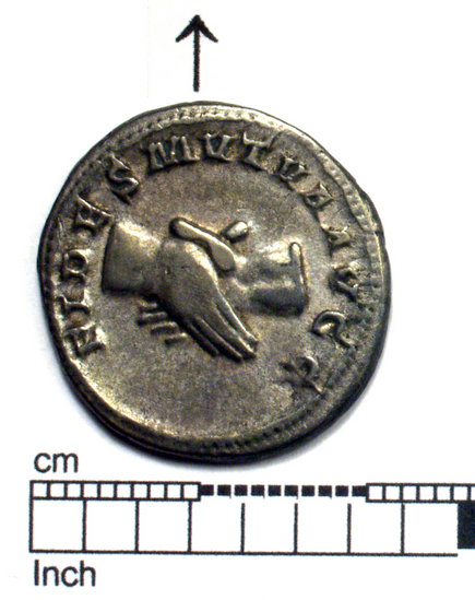 Hearst Museum object 6 of 8 titled Coin: æ denarius, accession number 8-6171, described as Coin: Denarius; Æ (AR?); Balbinus - 5.50 grams. Obverse: IMP CAES D CAEL BALBINVS AVG - Bust facing right, radiate, draped. Reverse: CONCORDIA AVGG  - Clasped hands.